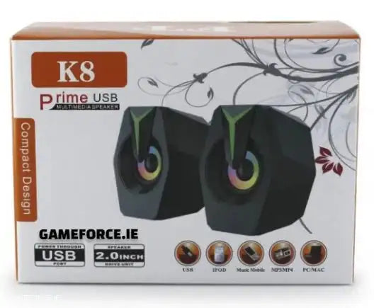 SPEAKER PRIME USB K8 GAMING SPEAKERS showing vibrant RGB lighting and compact design on a gaming desk setup